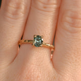 0.85ct Oval Precision Cut Ocean Blue Montana Sapphire Evergreen Carved 4 Prong Solitaire in 14k Yellow Gold