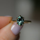 2.07ct Precision Cut Untreated Teal Oval Montana Sapphire Diamond-studded Sea Star Solitaire in 18k Yellow Gold