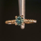 0.85ct Oval Precision Cut Ocean Blue Montana Sapphire Evergreen Carved 4 Prong Solitaire in 14k Yellow Gold