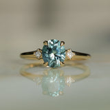 1.77ct Oval Precision Cut Parti Light Teal Montana Sapphire and Princess Cut Diamond Rapids Low Profile Ring in 14k Yellow Gold