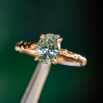 1.58ct Oval Untreated Light Blue Montana Sapphire Evergreen Carved 4 Prong Solitaire in 14k Yellow Gold