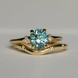 1.77ct Oval Precision Cut Parti Light Teal Montana Sapphire and Princess Cut Diamond Rapids Low Profile Ring in 14k Yellow Gold