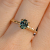 0.80ct Oval Precision Cut Blue Montana Sapphire Evergreen Carved 4 Prong Solitaire in 14k Yellow Gold