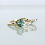 1.41ct Oval Teal Parti Montana Sapphire and Princess Cut Diamond Rapids Low Profile Ring in 18k Yellow Gold