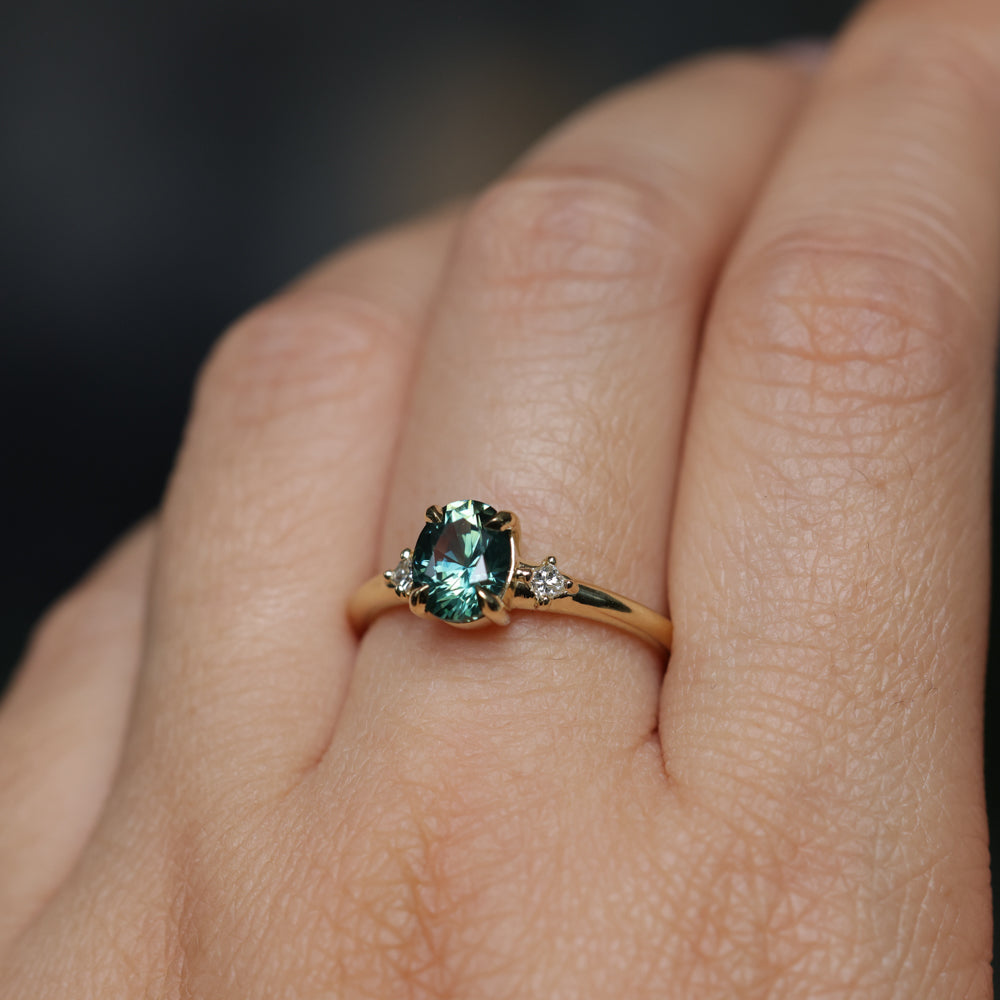 1.41ct Oval Teal Parti Montana Sapphire and Princess Cut Diamond Rapids Low Profile Ring in 18k Yellow Gold