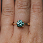 2.06ct Round Untreated Teal Montana Sapphire Hidden Halo Low Profile Evergreen Carved Four Prong Solitaire in 14k Yellow Gold
