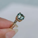 2.06ct Round Untreated Teal Montana Sapphire Hidden Halo Low Profile Evergreen Carved Four Prong Solitaire in 14k Yellow Gold