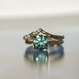2.06ct Round Untreated Teal Montana Sapphire Hidden Halo Low Profile Evergreen Carved Four Prong Solitaire in 14k Yellow Gold
