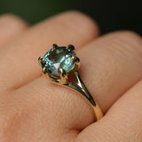 3.01ct Round GIA Teal Montana Sapphire Low Profile Six Prong Split Shank Solitaire in 18k Yellow Gold