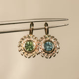 Round Precision Cut Montana Sapphire Vine Frame Bezel Set Pendants in 14k Yellow Gold