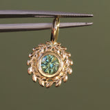 Round Precision Cut Montana Sapphire Vine Frame Bezel Set Pendants in 14k Yellow Gold