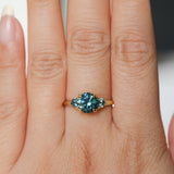1.82ct Round Teal Precision Cut Montana Sapphire and Trillion Sapphire Low Profile Three Stone Ring in 18k Yellow Gold