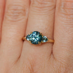 1.82ct Round Teal Precision Cut Montana Sapphire and Trillion Sapphire Low Profile Three Stone Ring in 18k Yellow Gold