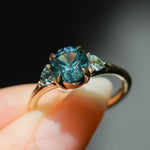 1.82ct Round Teal Precision Cut Montana Sapphire and Trillion Sapphire Low Profile Three Stone Ring in 18k Yellow Gold