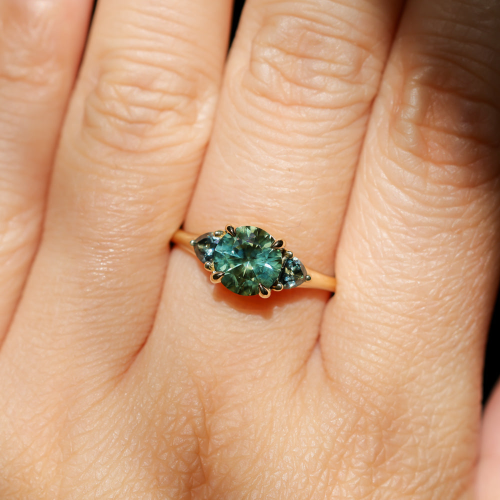 1.82ct Round Teal Precision Cut Montana Sapphire and Trillion Sapphire Low Profile Three Stone Ring in 18k Yellow Gold