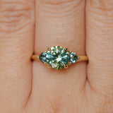 1.50ct Round Parti Yellow Blue Precision Cut Montana Sapphire and Trillion Sapphire Low Profile Three Stone Ring in 18k Yellow Gold