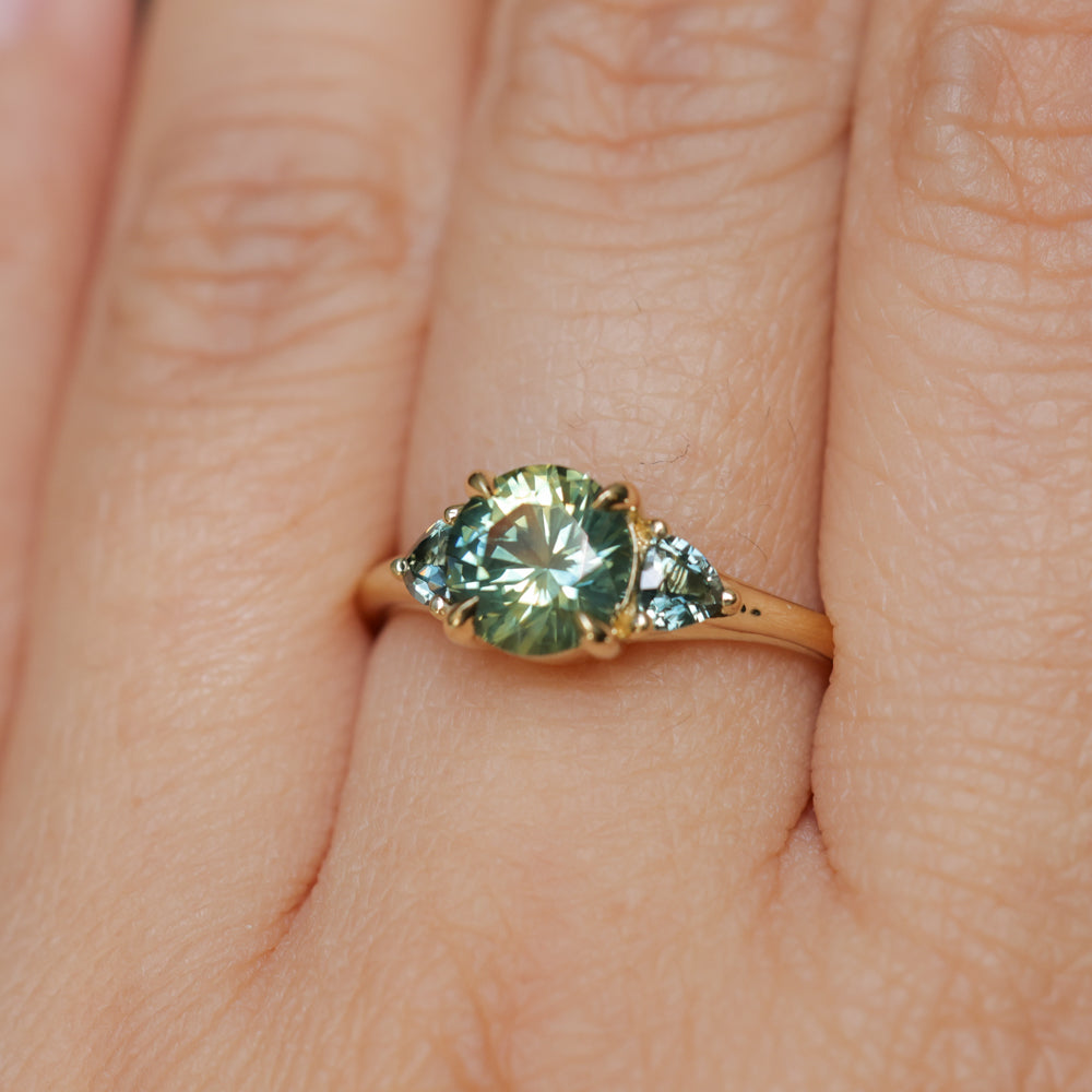1.50ct Round Parti Yellow Blue Precision Cut Montana Sapphire and Trillion Sapphire Low Profile Three Stone Ring in 18k Yellow Gold