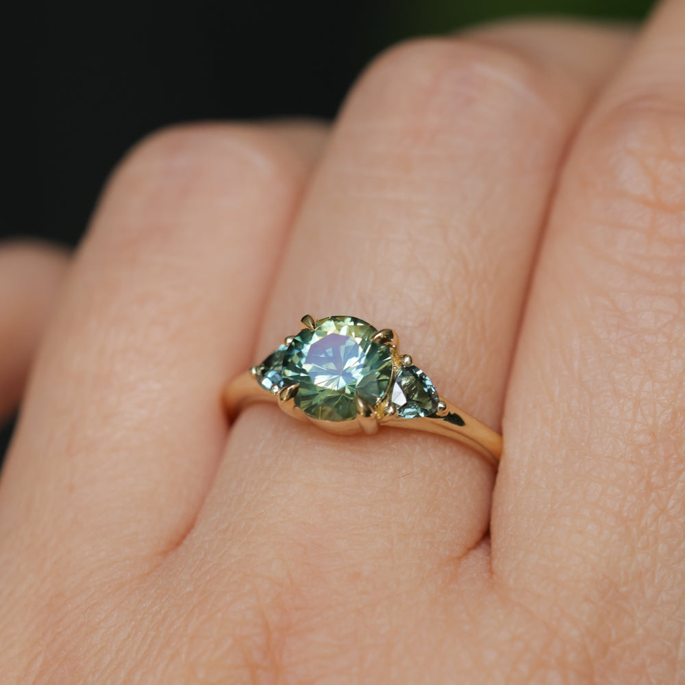 1.50ct Round Parti Yellow Blue Precision Cut Montana Sapphire and Trillion Sapphire Low Profile Three Stone Ring in 18k Yellow Gold