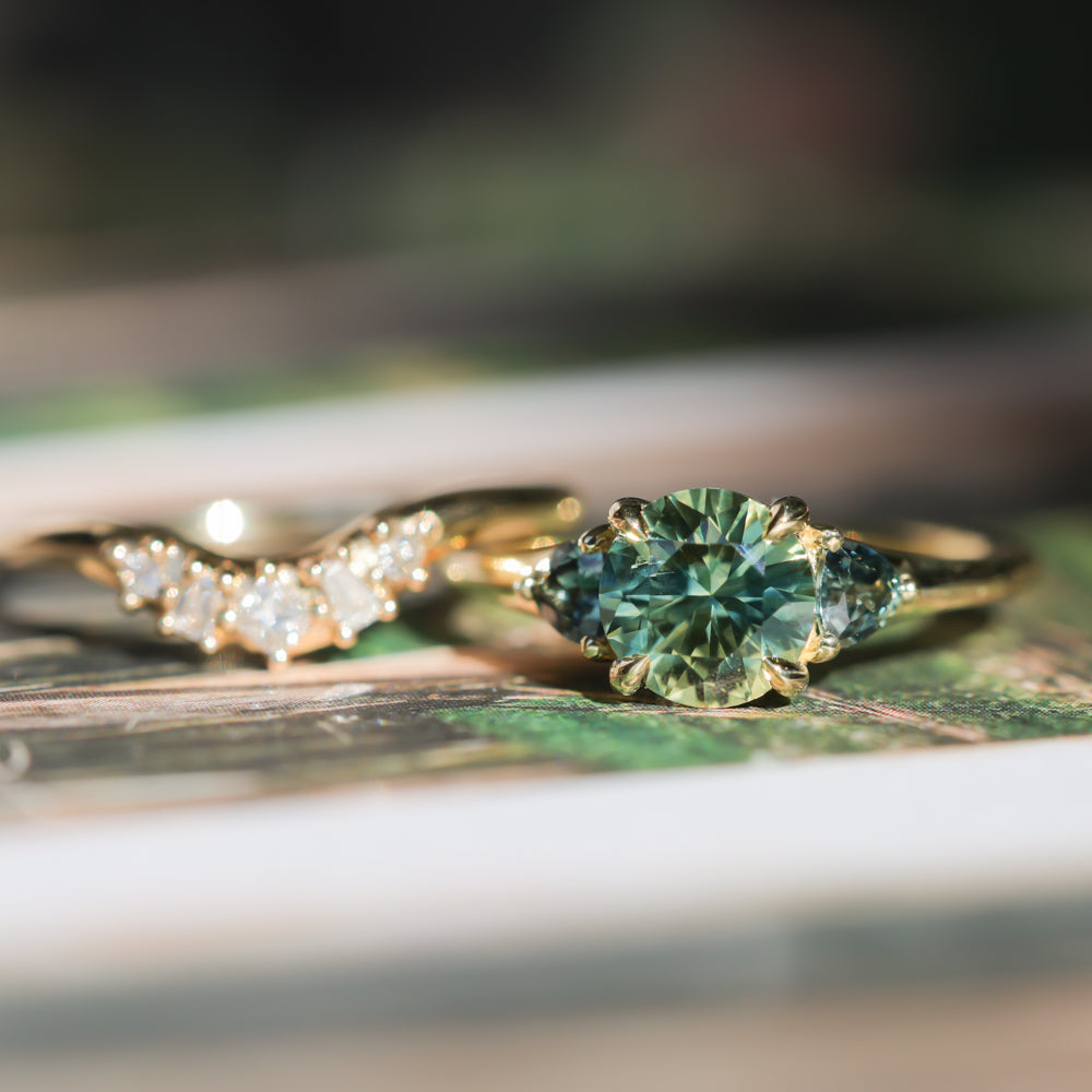 1.50ct Round Parti Yellow Blue Precision Cut Montana Sapphire and Trillion Sapphire Low Profile Three Stone Ring in 18k Yellow Gold