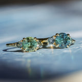 1.50ct Round Parti Yellow Blue Precision Cut Montana Sapphire and Trillion Sapphire Low Profile Three Stone Ring in 18k Yellow Gold