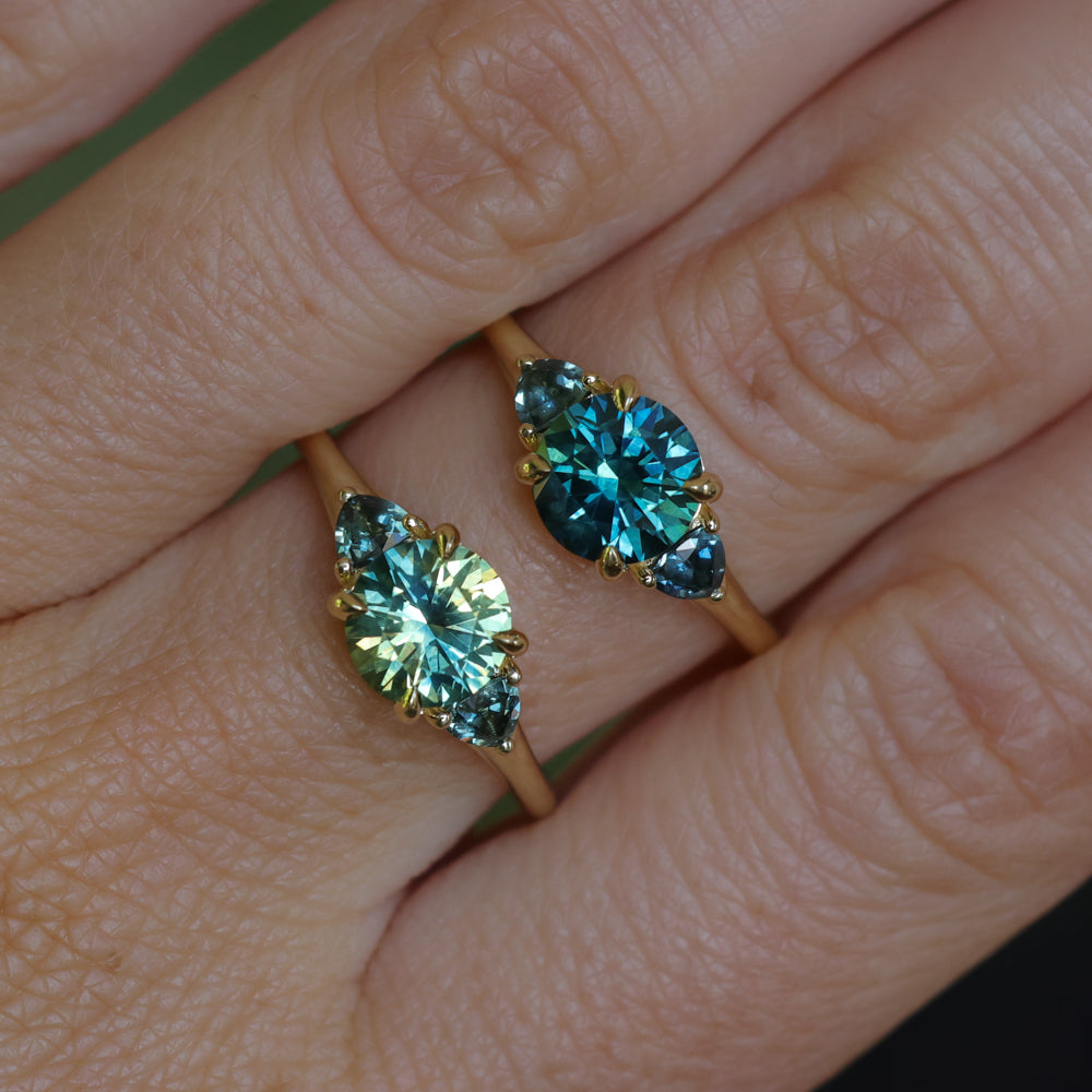 1.50ct Round Parti Yellow Blue Precision Cut Montana Sapphire and Trillion Sapphire Low Profile Three Stone Ring in 18k Yellow Gold