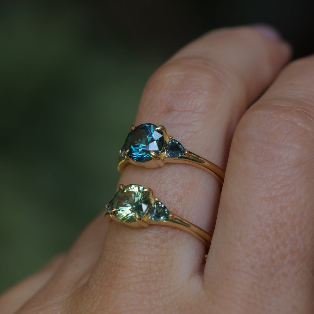 1.50ct Round Parti Yellow Blue Precision Cut Montana Sapphire and Trillion Sapphire Low Profile Three Stone Ring in 18k Yellow Gold