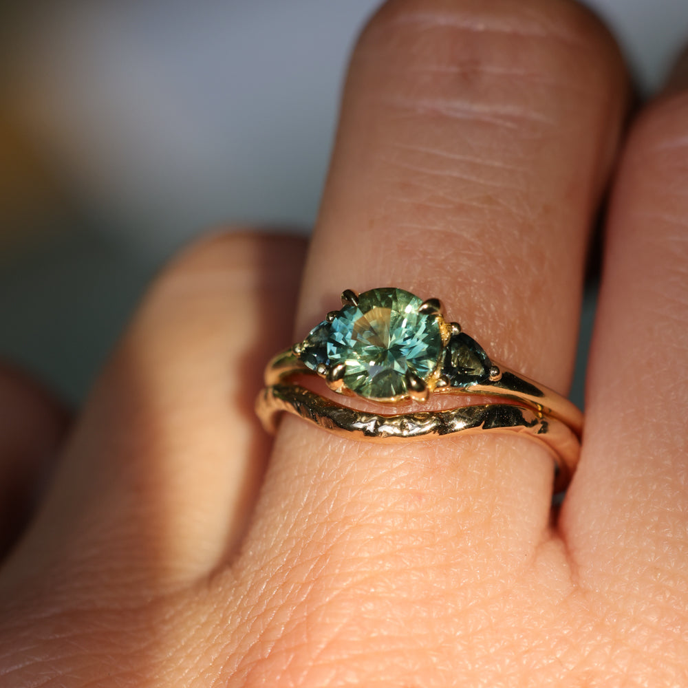 1.50ct Round Parti Yellow Blue Precision Cut Montana Sapphire and Trillion Sapphire Low Profile Three Stone Ring in 18k Yellow Gold