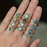 0.73ct Oval Unheated Montana Sapphire and Trillion Diamond Low Profile Ring in 14k Yellow Gold