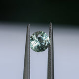 1.06CT ROUND MONTANA SAPPHIRE, LIGHT PARTI YELLOW BLUE, UNTREATED, 6.1X4MM