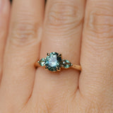 1.51ct Oval Teal Blue Precision Cut Montana Sapphire and Pear Sapphire Low Profile Three Stone Ring in 14k Yellow Gold