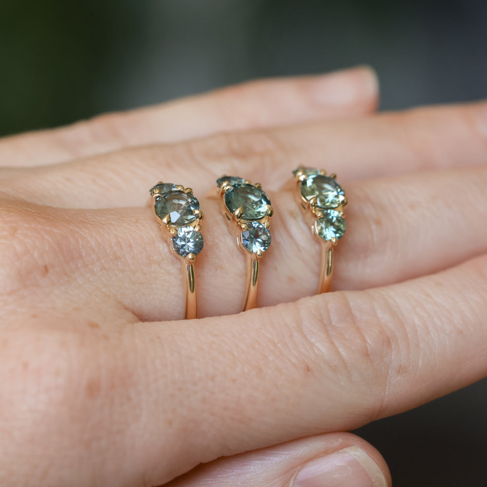 0.91ct Round Unheated Teal Green Montana Sapphire and Montana Sapphire Side Three Stone Ring in 14k Yellow Gold