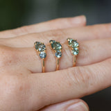 0.91ct Round Unheated Teal Green Montana Sapphire and Montana Sapphire Side Three Stone Ring in 14k Yellow Gold
