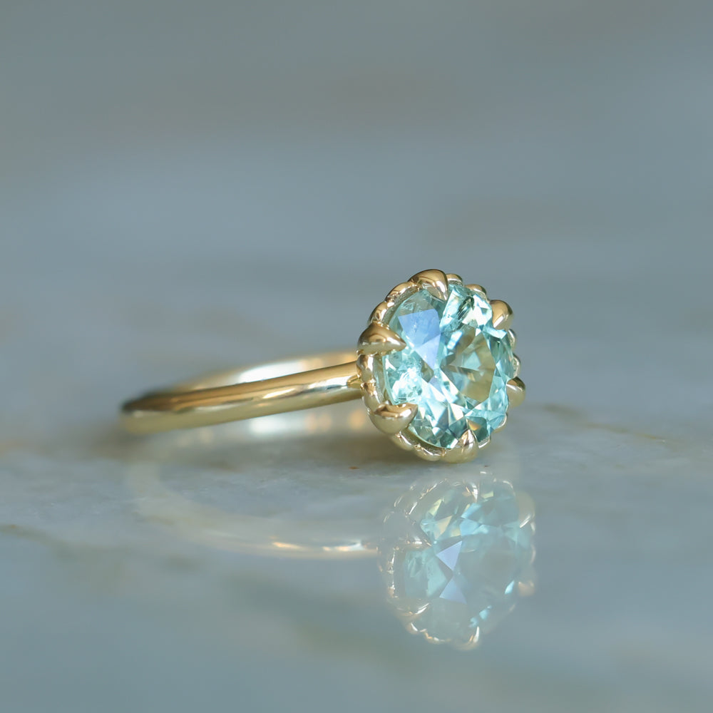 1.93ct Oval Silky Teal Montana Sapphire Scallop Cup Solitaire in 18k Yellow Gold