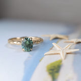 1.75ct Precision Cut Teal Oval Montana Sapphire Four Prong Evergreen Hidden Halo Solitaire in 14k Yellow Gold