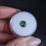 1.46CT ROUND PRECISION CUT MONTANA SAPPHIRE, TEAL GREEN, UNTREATED, 7.08X4.1MM