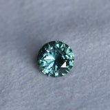 1.46CT ROUND PRECISION CUT MONTANA SAPPHIRE, TEAL GREEN, UNTREATED, 7.08X4.1MM