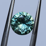 1.46CT ROUND PRECISION CUT MONTANA SAPPHIRE, TEAL GREEN, UNTREATED, 7.08X4.1MM
