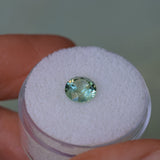 1.61CT ROUND PRECISION CUT MONTANA SAPPHIRE, LIGHT TEAL GREEN, 6.9X4.6MM