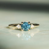 1.07ct Round Deep Teal Blue Montana Sapphire and Princess Cut Diamond Rapids Low Profile Ring in 14k Yellow Gold