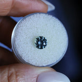 1.39CT ROUND PRECISION CUT MONTANA SAPPHIRE, COLOR SHIFTING TEAL TO PURPLE GREY, 6.5X4.3MM