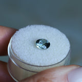 1.39CT ROUND PRECISION CUT MONTANA SAPPHIRE, COLOR SHIFTING TEAL TO PURPLE GREY, 6.5X4.3MM