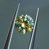 1.39CT ROUND PRECISION CUT MONTANA SAPPHIRE, BICOLOR YELLOW BLUE, 6.6X4.3MM