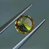 1.39CT ROUND PRECISION CUT MONTANA SAPPHIRE, BICOLOR YELLOW BLUE, 6.6X4.3MM
