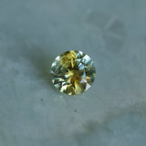 1.39CT ROUND PRECISION CUT MONTANA SAPPHIRE, BICOLOR YELLOW BLUE, 6.6X4.3MM