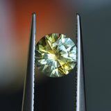 1.39CT ROUND PRECISION CUT MONTANA SAPPHIRE, BICOLOR YELLOW BLUE, 6.6X4.3MM