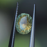 1.75CT PRECISION CUT OVAL MONTANA SAPPHIRE, EARTHY COPPER YELLOW TEAL, 7.8X6.3X4.7MM