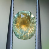 1.75CT PRECISION CUT OVAL MONTANA SAPPHIRE, EARTHY COPPER YELLOW TEAL, 7.8X6.3X4.7MM