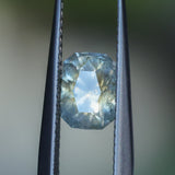 1.51CT RADIANT CUT MONTANA SAPPHIRE, ETHERIAL PARTI BLUE GOLD, 7.4X5.5X4.5MM