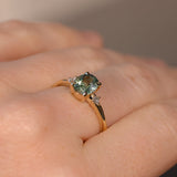 1.20ct Oval Brilliant Teal Montana Sapphire and Princess Cut Diamond Rapids Low Profile Ring in 14k Yellow Gold