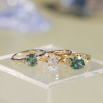 1.20ct Oval Brilliant Teal Montana Sapphire and Princess Cut Diamond Rapids Low Profile Ring in 14k Yellow Gold